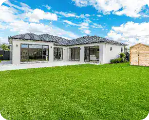 Modern House Backyard With Green Lawn Patio Wooden Shed